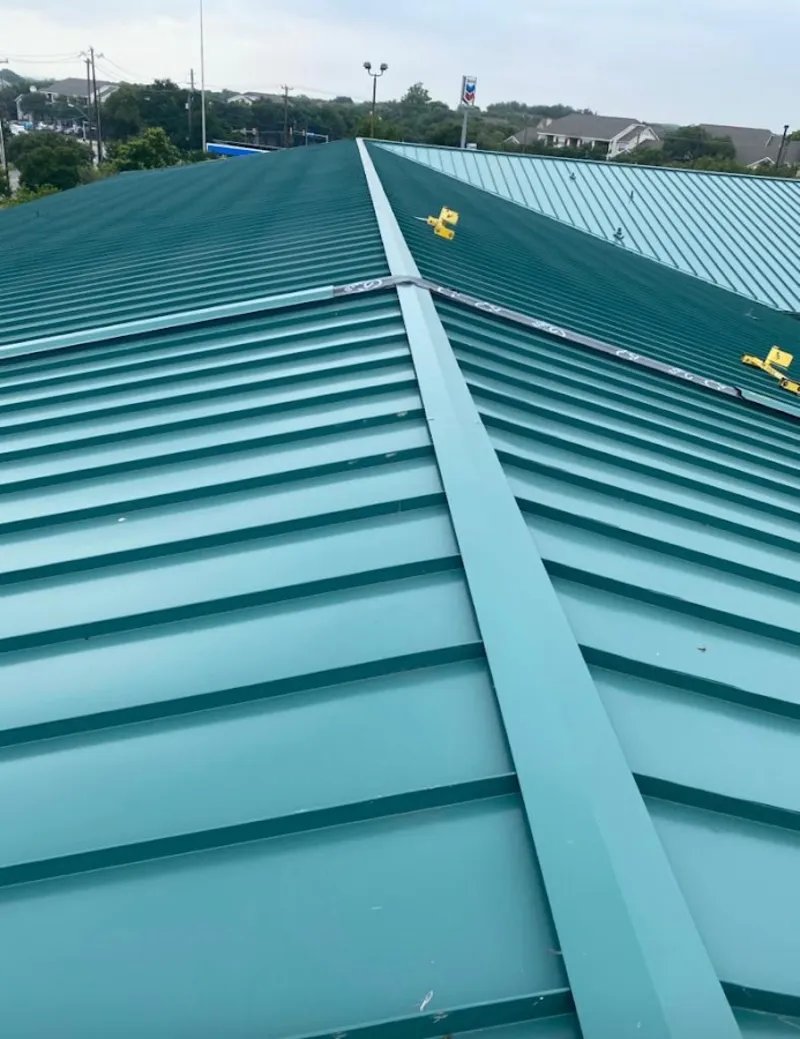 Green commercial metal roof ridge and valley for Metal Roof Repair in Ocean Shores